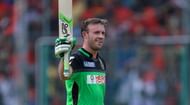 AB de Villiers celebrating after scoring a century against Gujarat Lions.